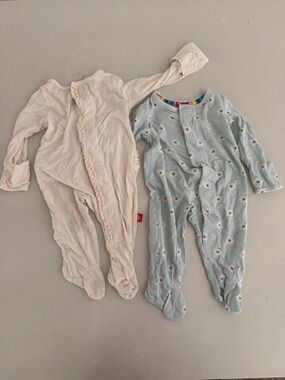 Two Magnetic Me modal onesies